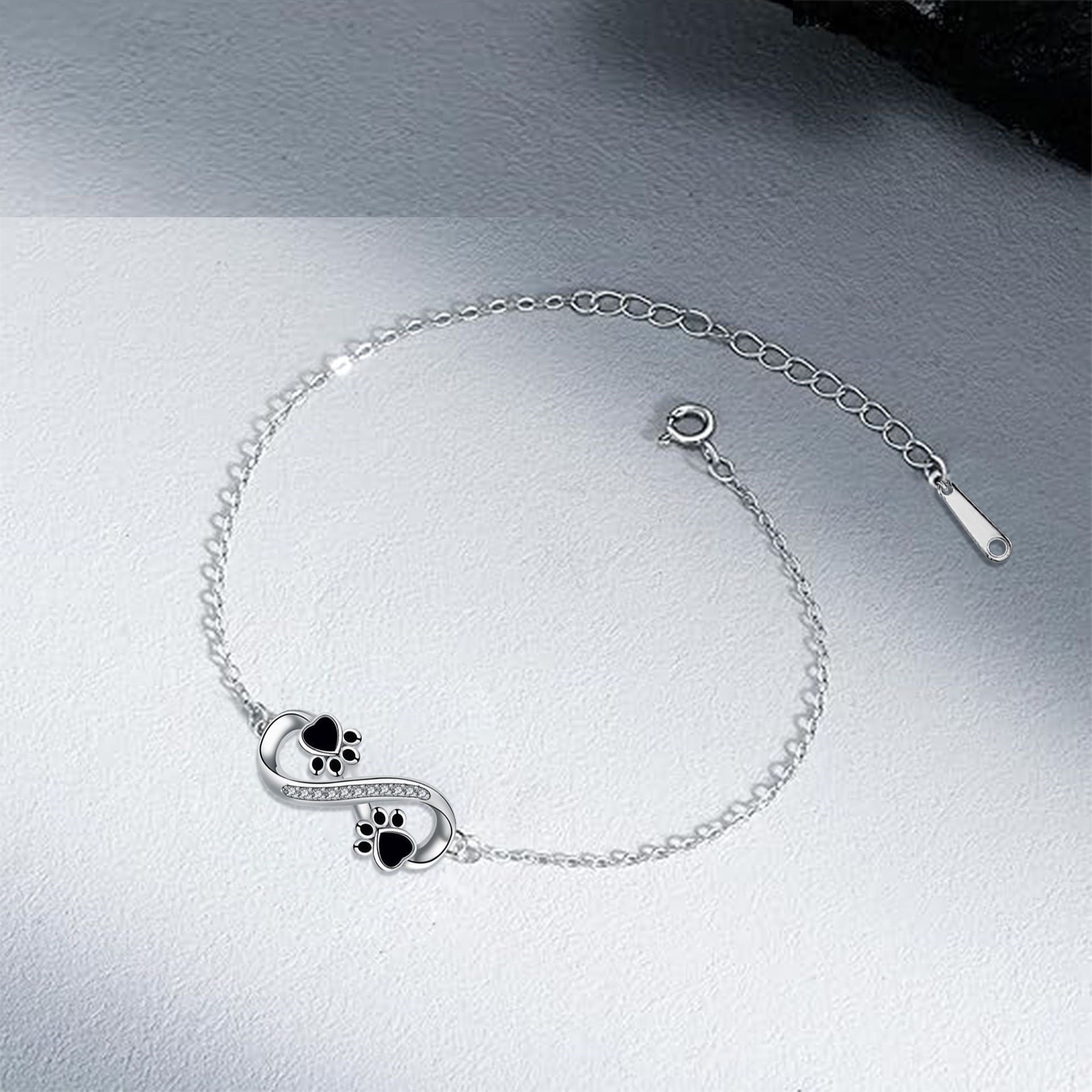 Infinity Symbol Bracelet with Paw Print Charm & Cubic Zirconia